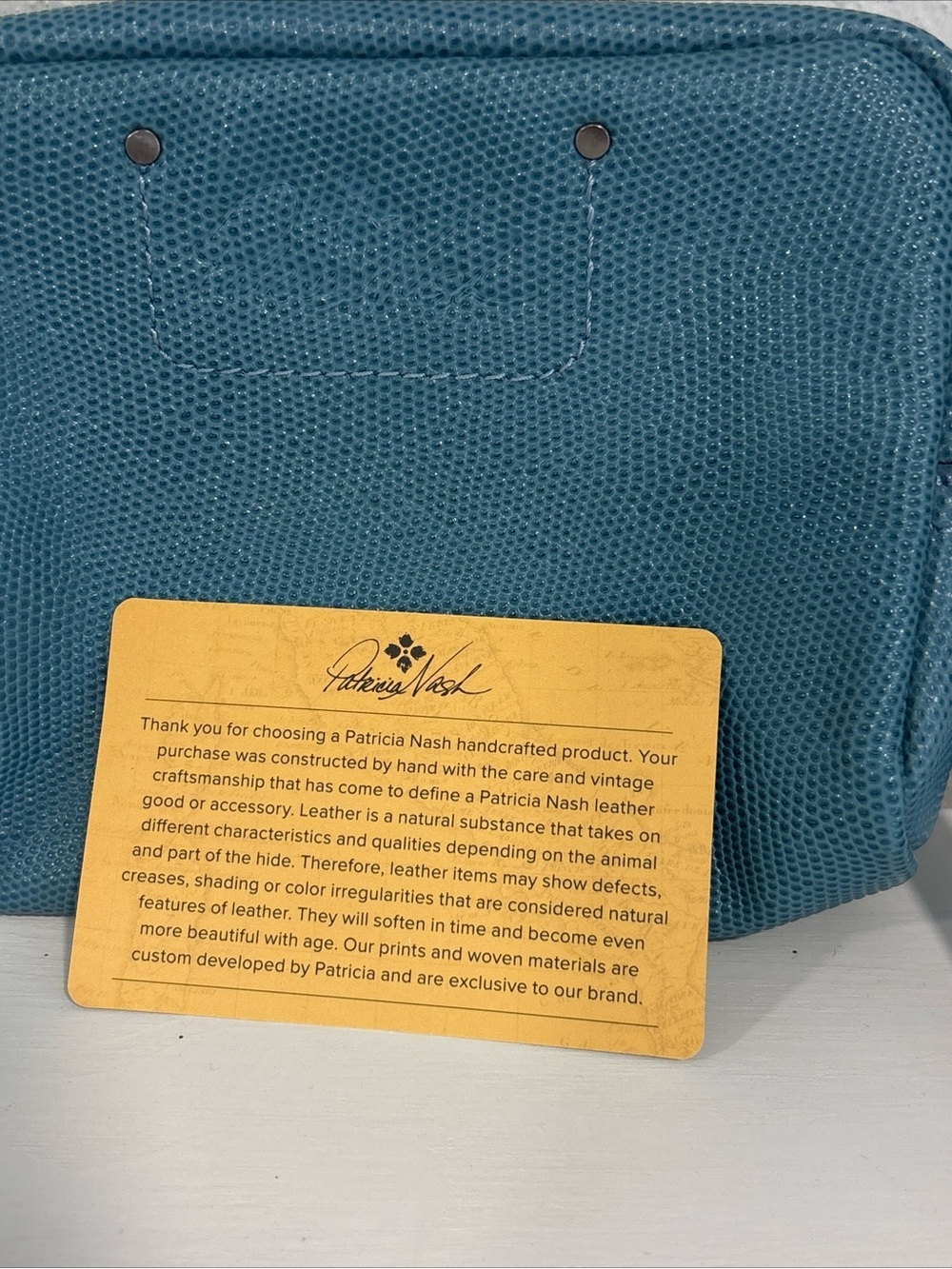 Patricia Nash Teal Pebbled Leather Wallet with Brass Accents